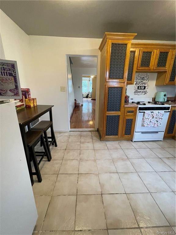 14. Residential for Sale at 7711 65th Street Glendale, New York 11385 United States
