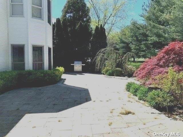 18. Residential for Sale at 145 Country Club Drive # 145 Commack, New York 11725 United States